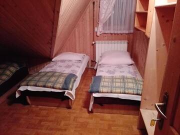 Фото номера Трехместный номер с общей ванной комнатой Проживание в семье Pokoje Goscinne U Elzbiety г. Мале-Цихе 5
