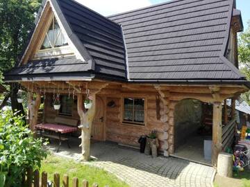 Фото Дома для отпуска Domek Góralski W Ogrodzie г. Мале-Цихе 1